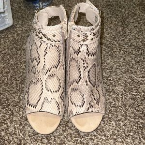 Snake skin heels. Size 7. Selling just because I never wear them. Super cute.